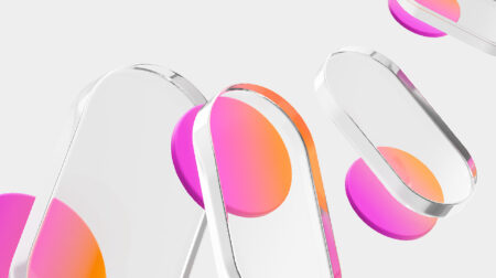 A series of transparent, oval-shaped objects with rounded edges, each containing a gradient-colored circle transitioning from pink to orange, arranged diagonally on a light gray background.