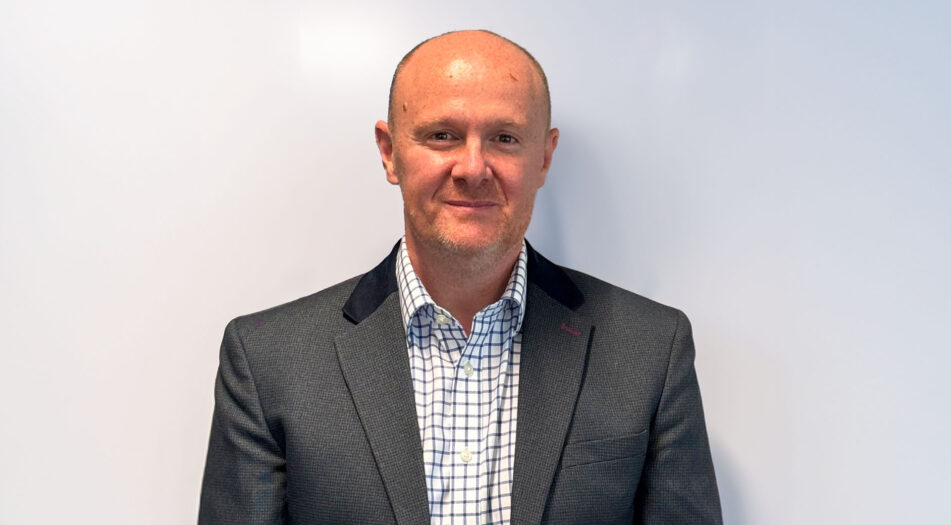 A headshot of David Samper.