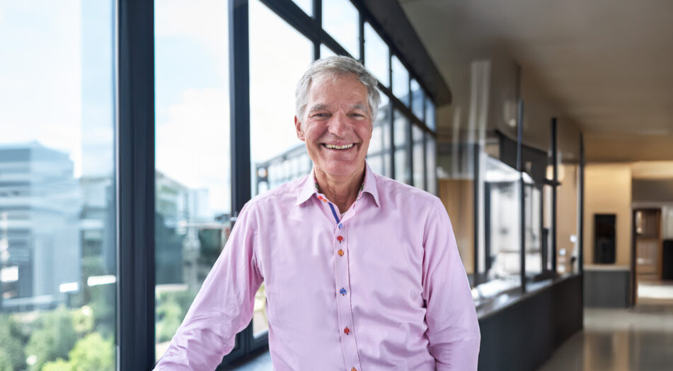 A shot of Charles McManus in a modern office.